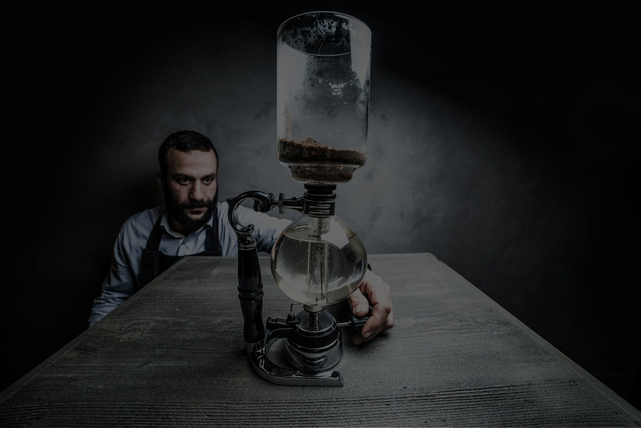Brewing siphon coffee at Dimitri's Coffee